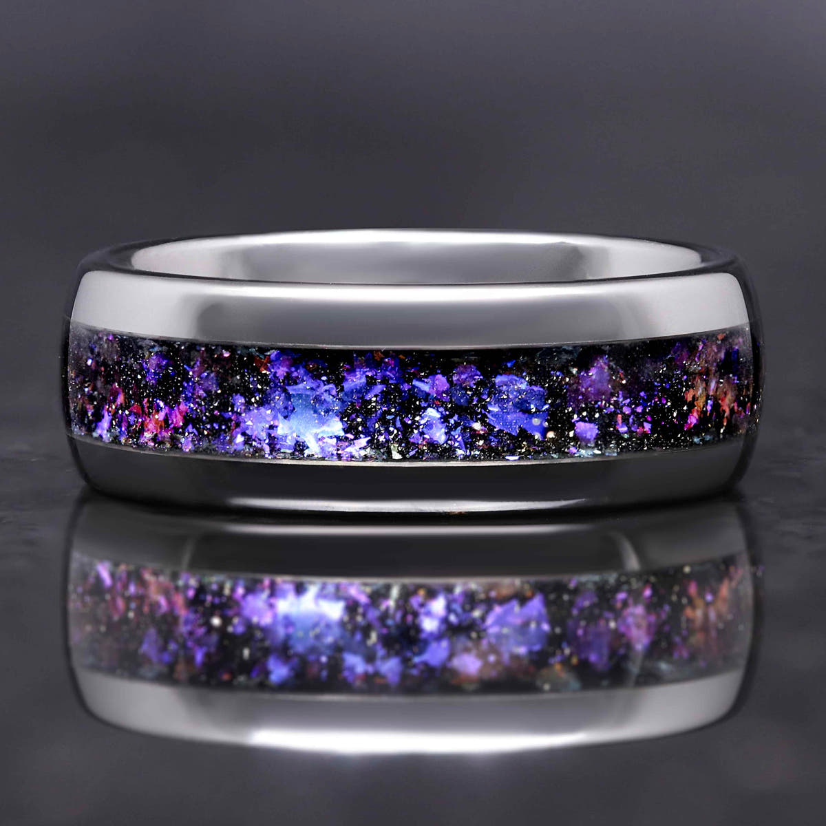 Men's silver tungsten wedding band with Orion nebula sandstone inlay, polished dome, front view