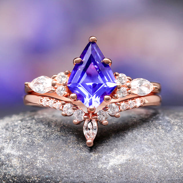Women's rose gold sterling silver kite-cut sapphire bridal set with marquise accents, front view
