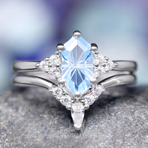 Elongated hexagon aquamarine bridal set in sterling silver with a curved band, front view