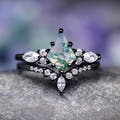 Women's black sterling silver kite moss agate engagement ring with marquise side stones, straight on