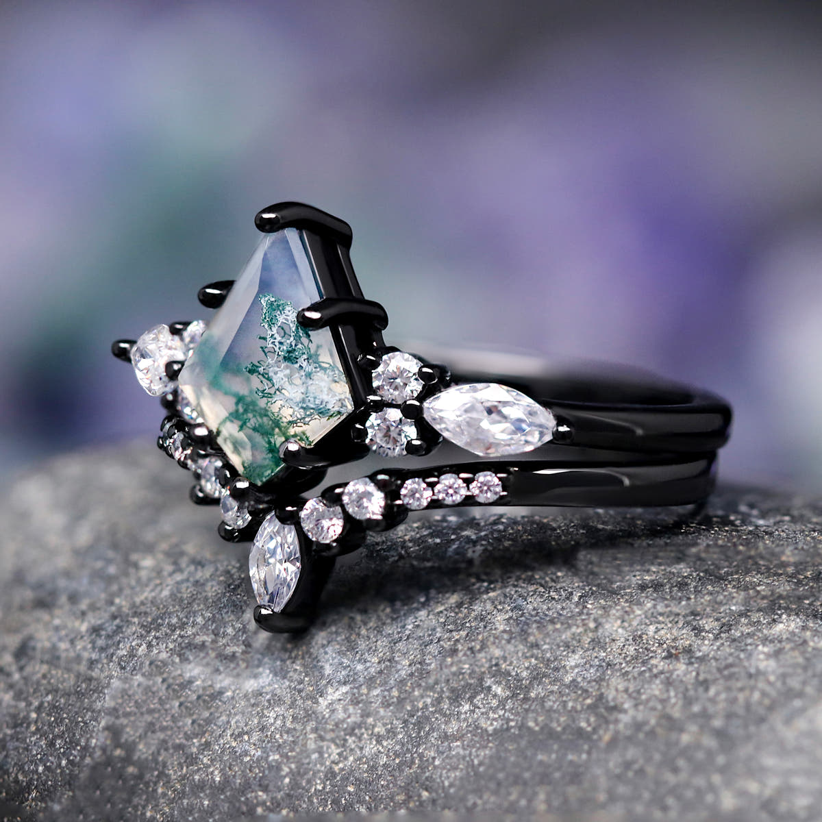 Angled side view of the black moss agate bridal set with white marquise accents