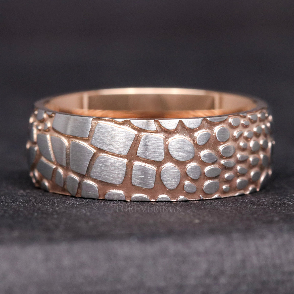 Men's 8mm two-tone rose gold and silver Damascus steel band with an etched scale pattern