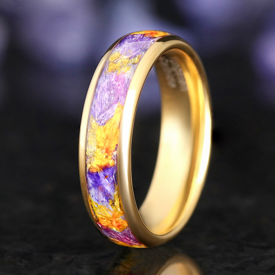 Matching gold tungsten wedding bands with forget-me-not flowers