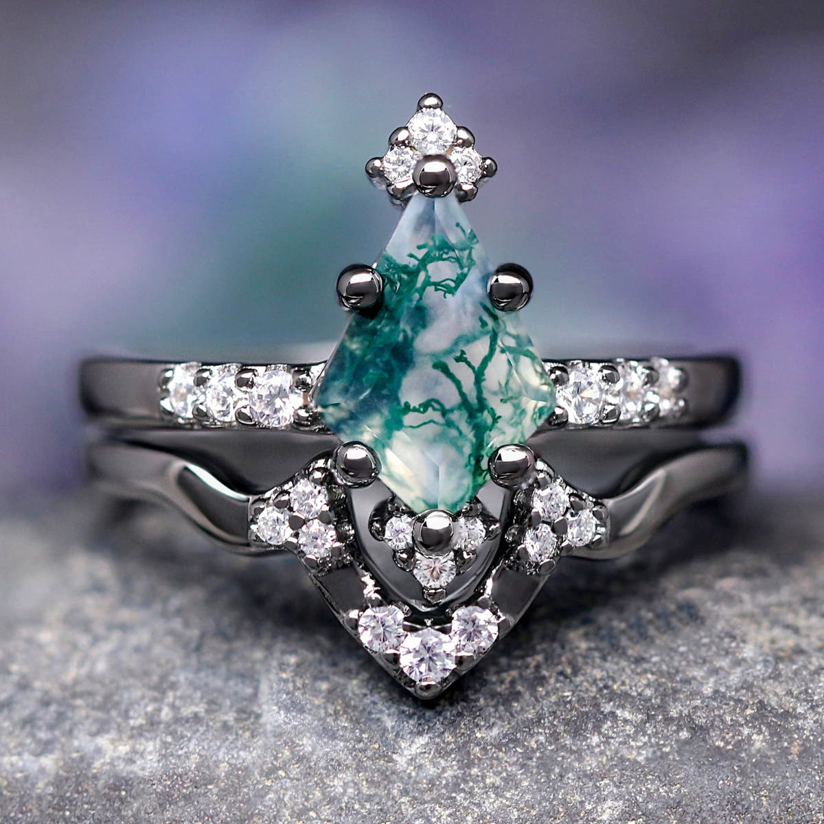 Women's kite-cut moss agate engagement ring set in black sterling silver, shown straight on
