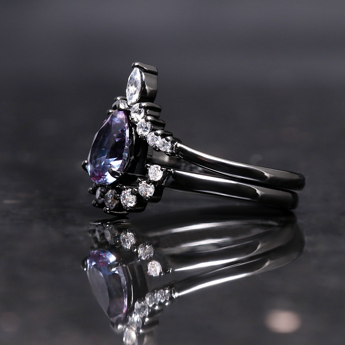 Black and purple couples wedding bands with alexandrite