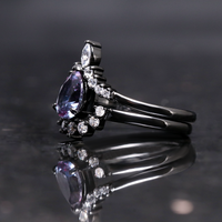 Black and purple couples wedding bands with alexandrite
