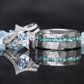 Lumiere aquamarine couples engagement and wedding ring set