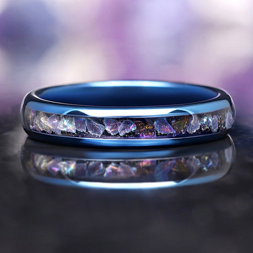 Moonstone tungsten wedding band with blue finish and glowing inlay, inspired by the Veil Nebula
