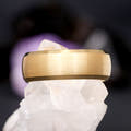 Men's 8mm brushed gold tungsten wedding band with polished beveled edges