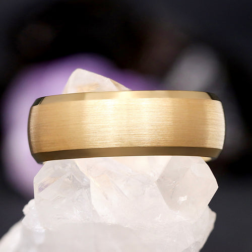 Men's brushed gold tungsten wedding band with beveled edges, shown straight on