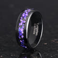 Men's 8mm black tungsten ring with alexandrite and purple sandstone inlay, angled to show the interior