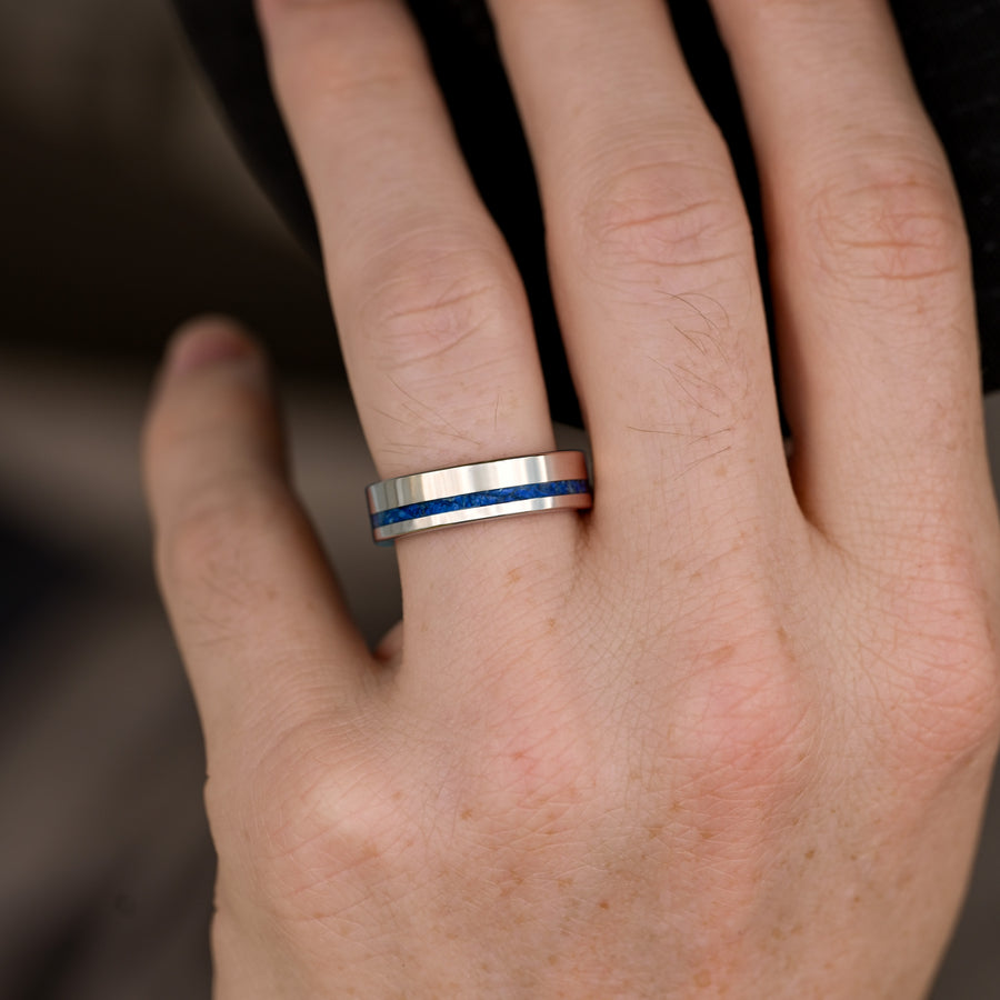 Men’s rose gold tungsten engagement ring with blue gemstone