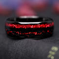 Men's 8mm black tungsten wedding band with two stripes of ruby inlay, shown straight on