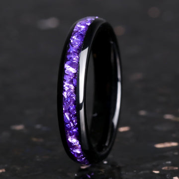 4mm black tungsten wedding band with crushed amethyst inlay, standing upright