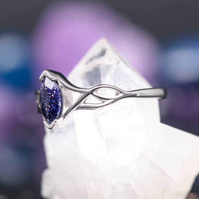 Sterling silver marquise blue sandstone ring, angled side view