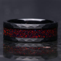 Crushed black fire opal inlay close-up on hammered black tungsten band