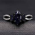 Black sterling silver marquise blue sandstone ring with crescent moon accents, straight on