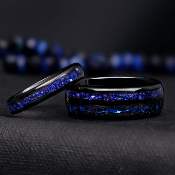 Matching black tungsten couples ring set with crushed blue sapphire inlays, 8mm and 4mm