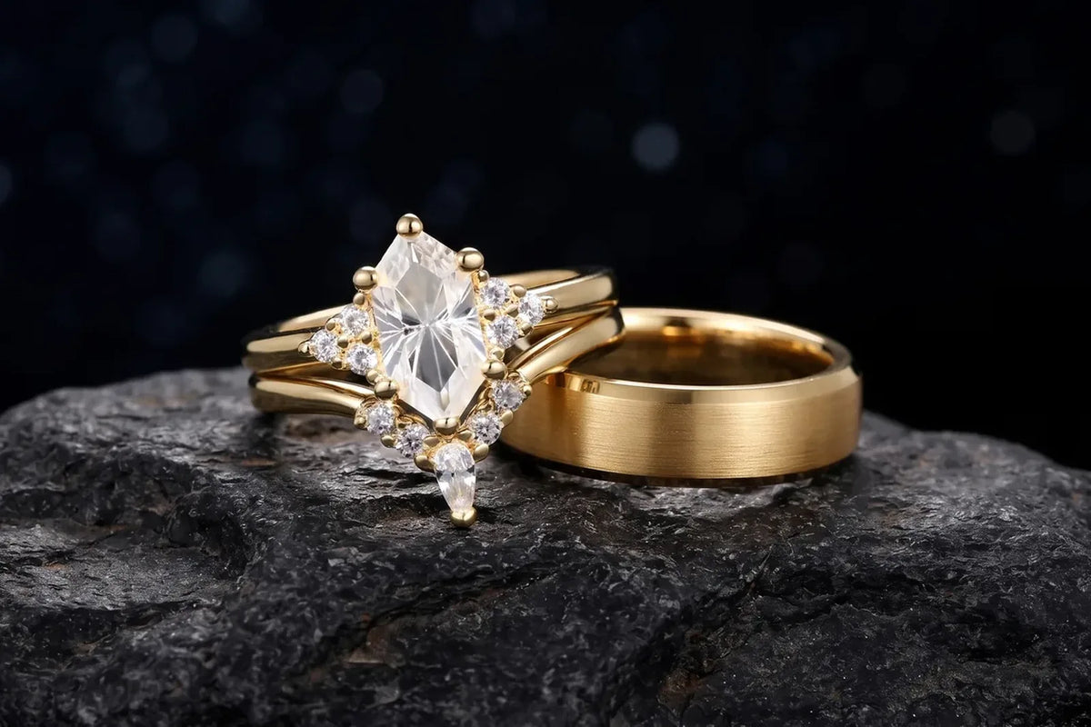 Gold couple rings: her stone-set engagement ring beside his brushed gold band