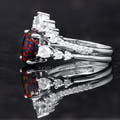 Black fire opal bridal set in sterling silver, side view with the curved band nested against the ring