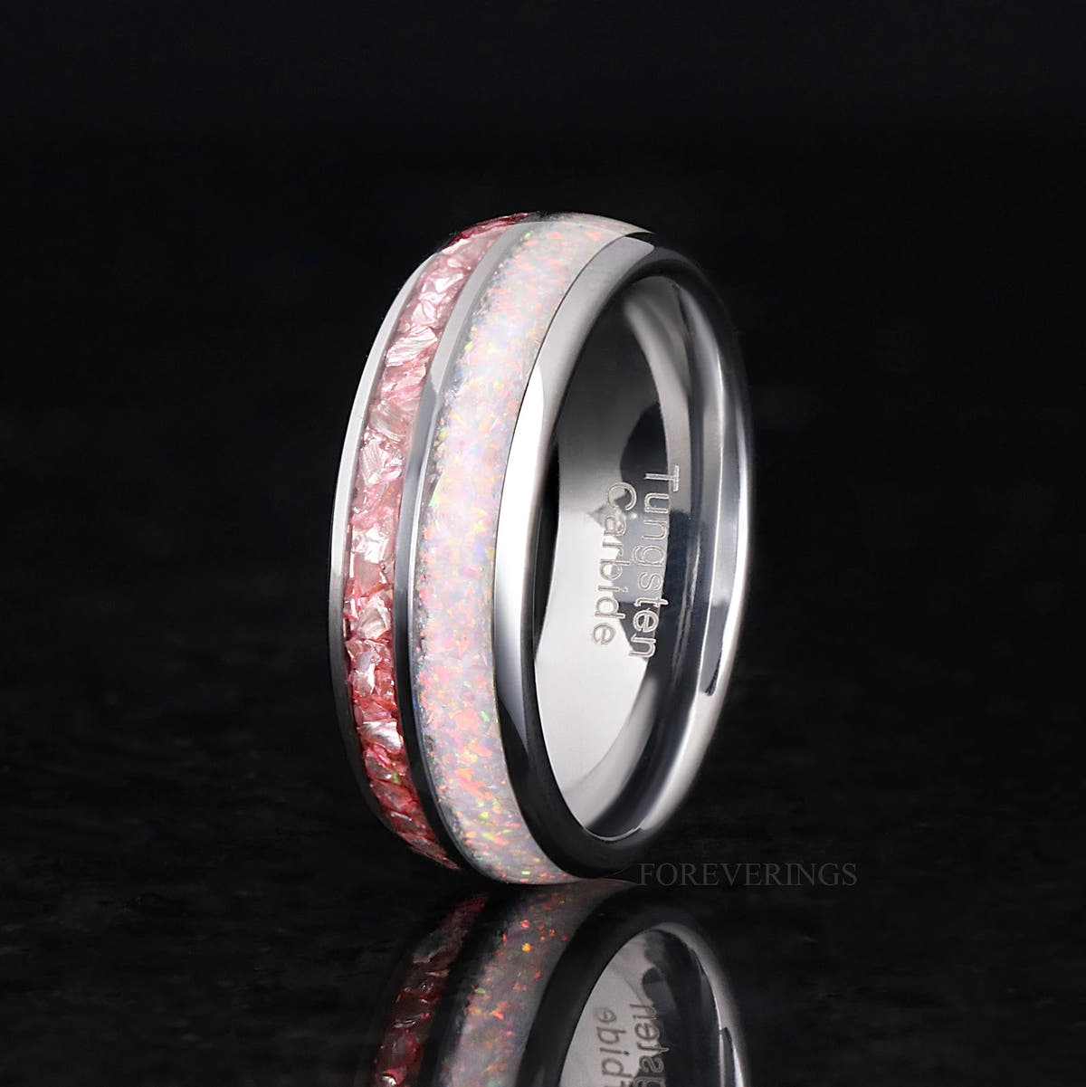 Men's 8mm silver tungsten ring with pink morganite and white fire opal inlay, angled view