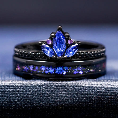Blue sapphire ring stacked on the black ceramic band with Orion nebula sandstone inlay