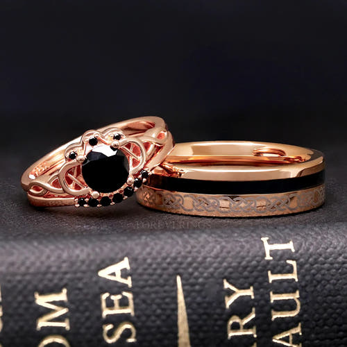 Matching rose gold Celtic knot couples ring set, black diamond engagement ring beside a 6mm tungsten band