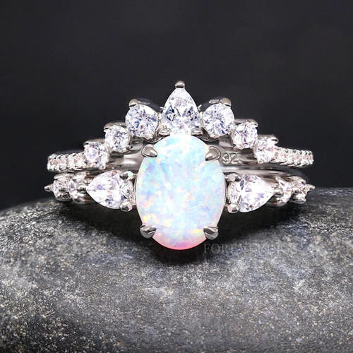 Women's vintage white fire opal bridal set in sterling silver, oval opal ring with a crown-style band