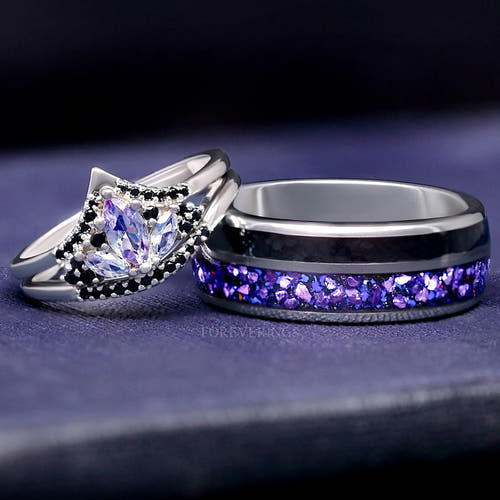Matching silver couples ring set: lotus alexandrite engagement ring beside an 8mm tungsten band with alexandrite inlay