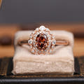 Women's rose gold sterling silver oval smoky quartz engagement ring in a velvet ring box