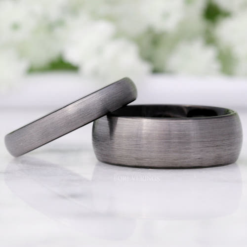 Matching brushed silver tungsten couples ring set with black interiors, 8mm and 4mm