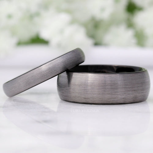 Matching brushed silver tungsten couples ring set with black interiors, 8mm and 4mm