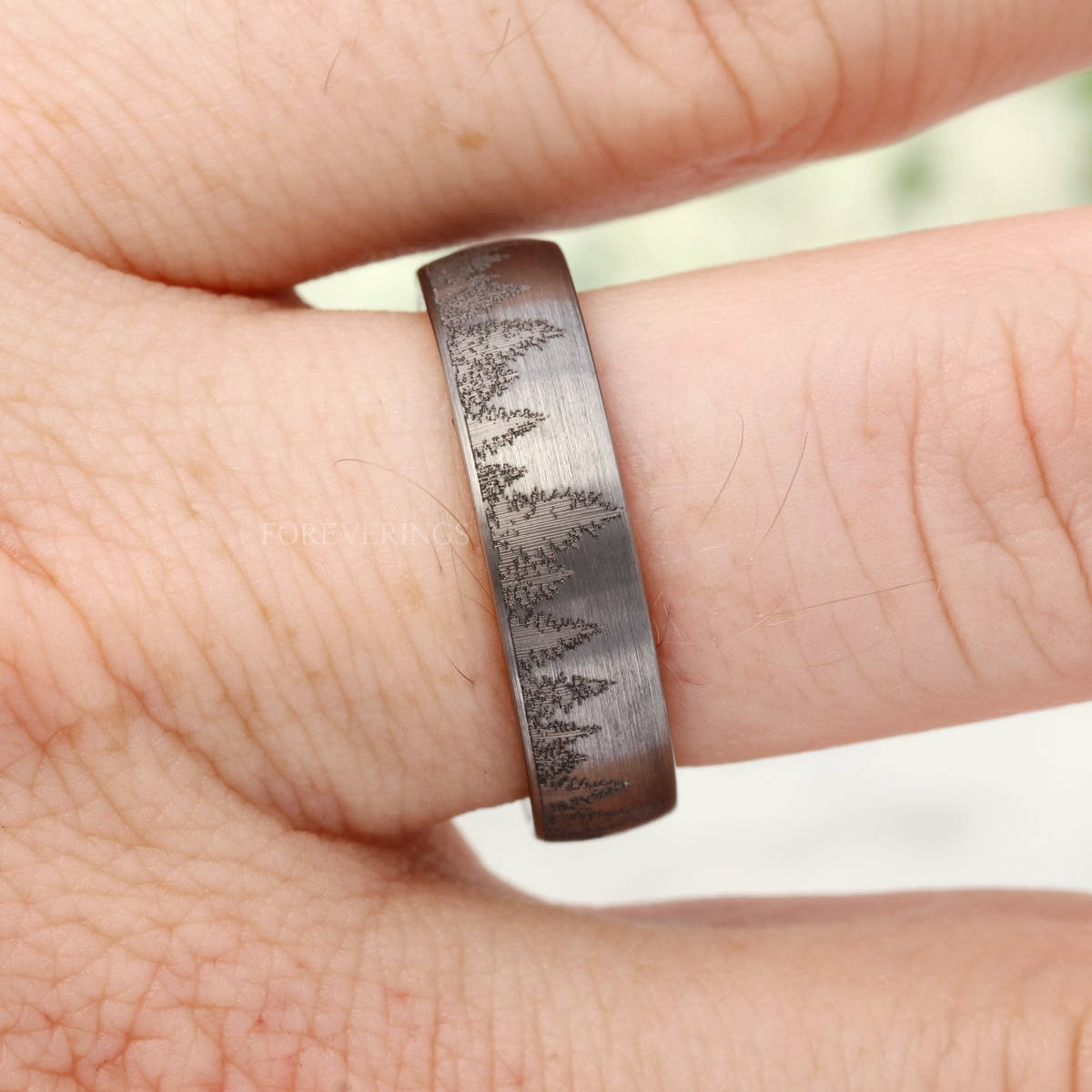 6mm silver tungsten forest tree-line band worn on a finger