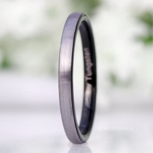 2mm two-tone tungsten wedding band, matte silver outside and black inside, standing upright