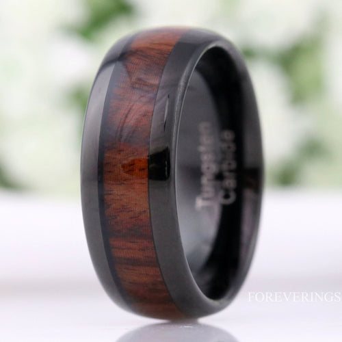 Men's 8mm black tungsten wedding band with koa wood inlay, polished dome
