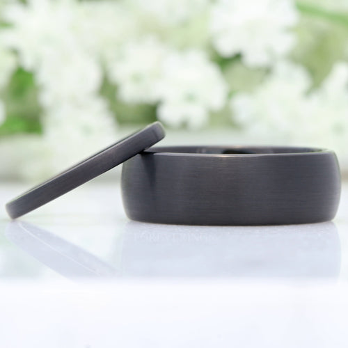 Matching black tungsten couples ring set, 8mm and 2mm bands with a brushed matte finish
