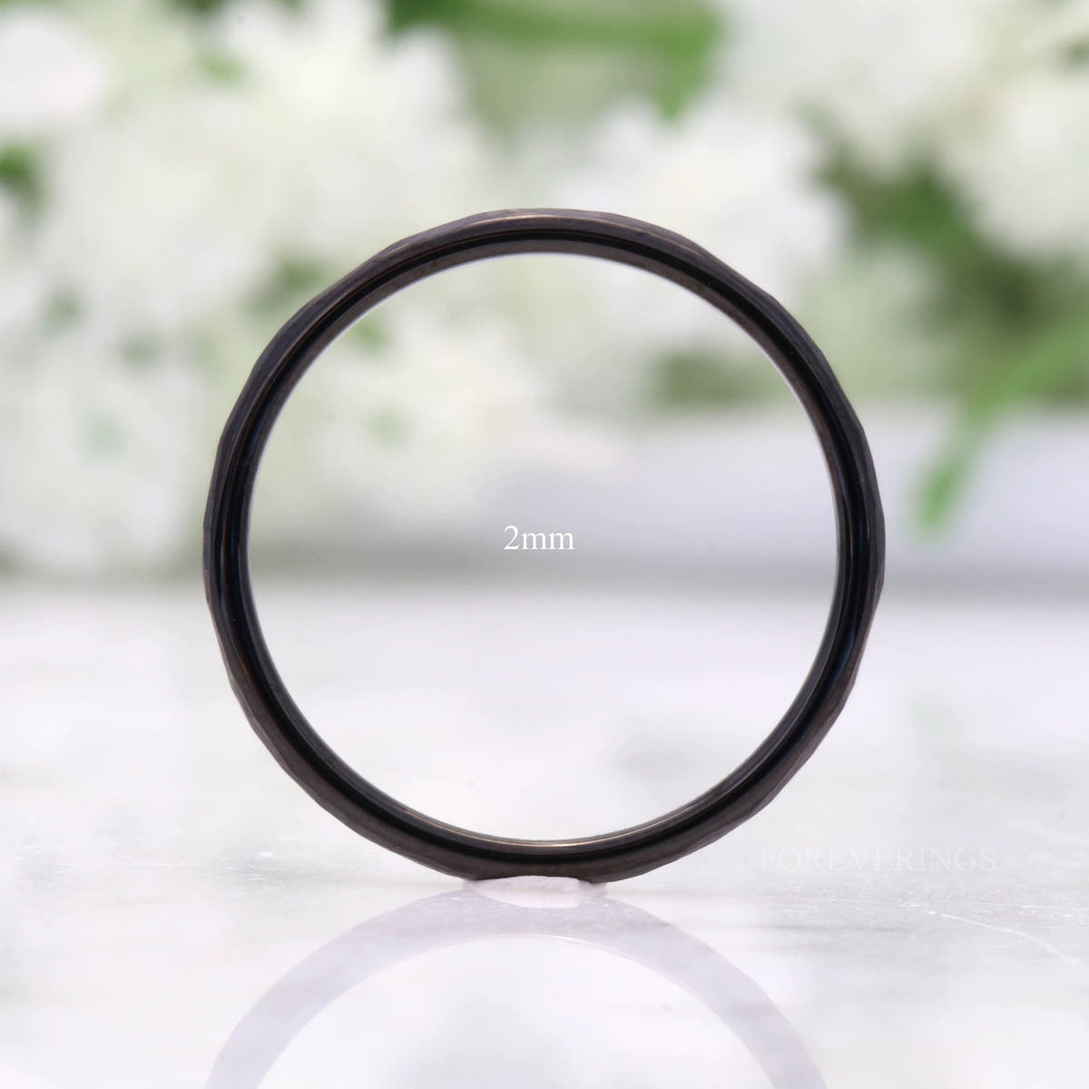 2mm hammered black tungsten band standing on edge as a full circle, labeled 2mm