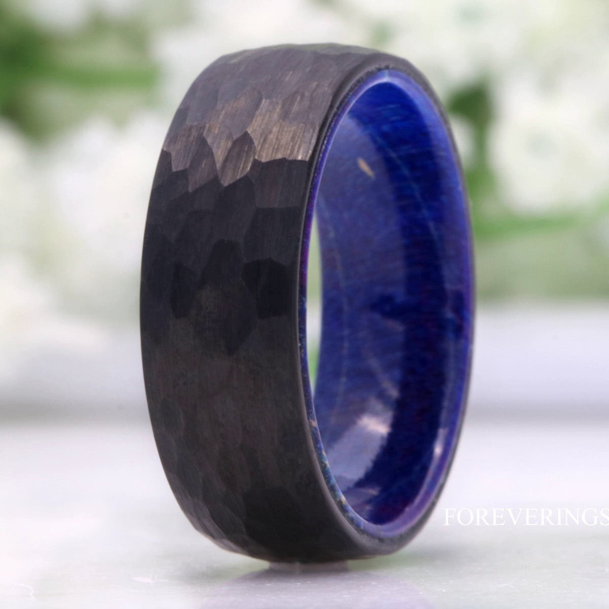 Men's 8mm hammered black tungsten wedding band with blue elder wood lining
