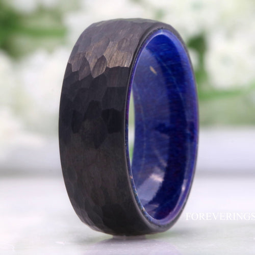 Men's 8mm hammered black tungsten wedding band with blue elder wood lining