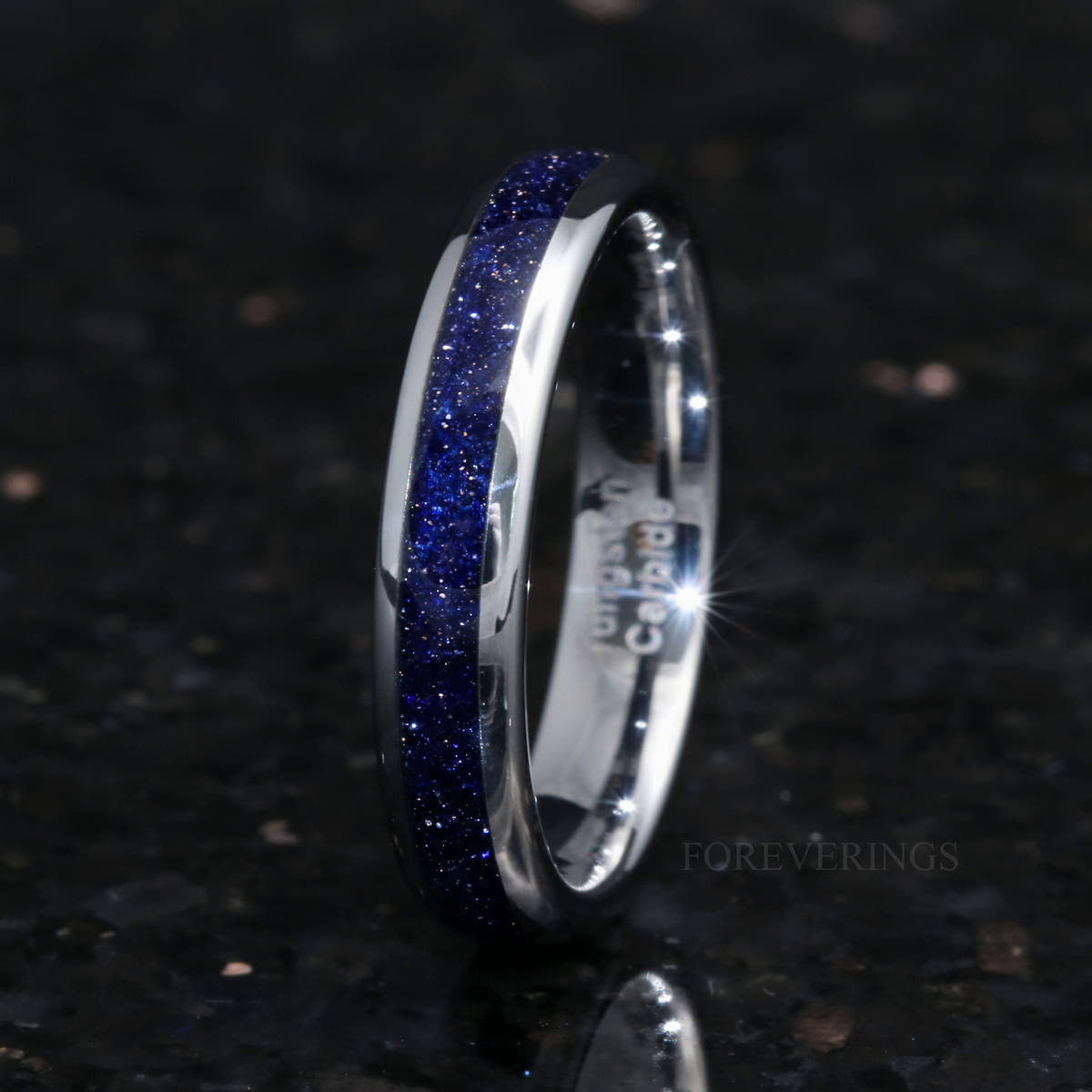 4mm silver tungsten Great Rift ring with blue sandstone, angled to show the interior