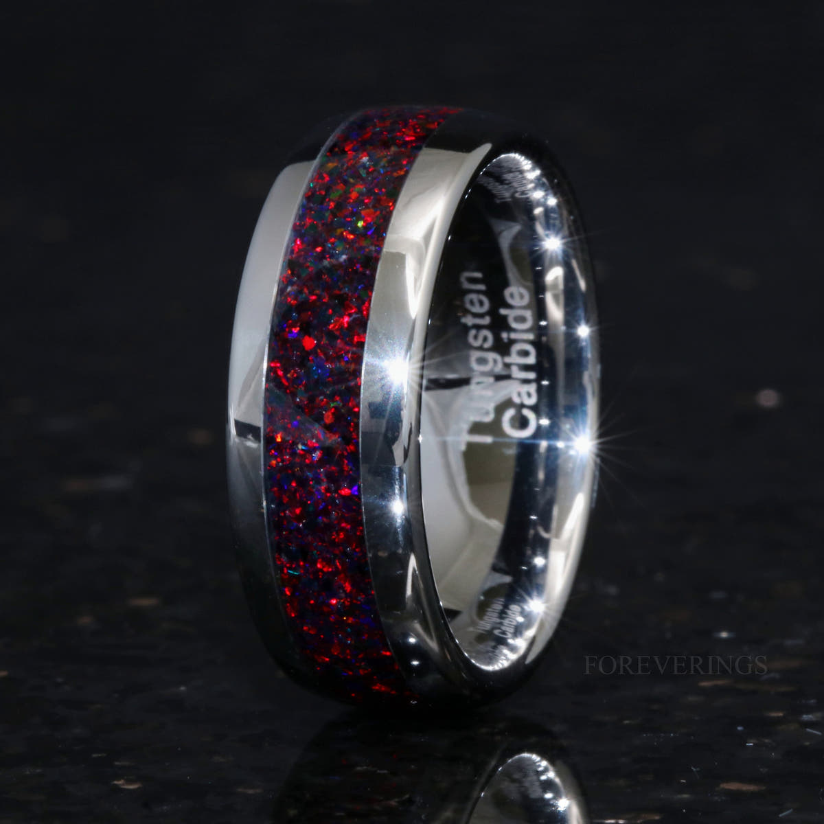 8mm silver tungsten black fire opal ring angled to show the polished interior