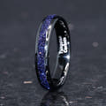Women's 4mm black tungsten ring with blue sandstone inlay, angled to show the interior