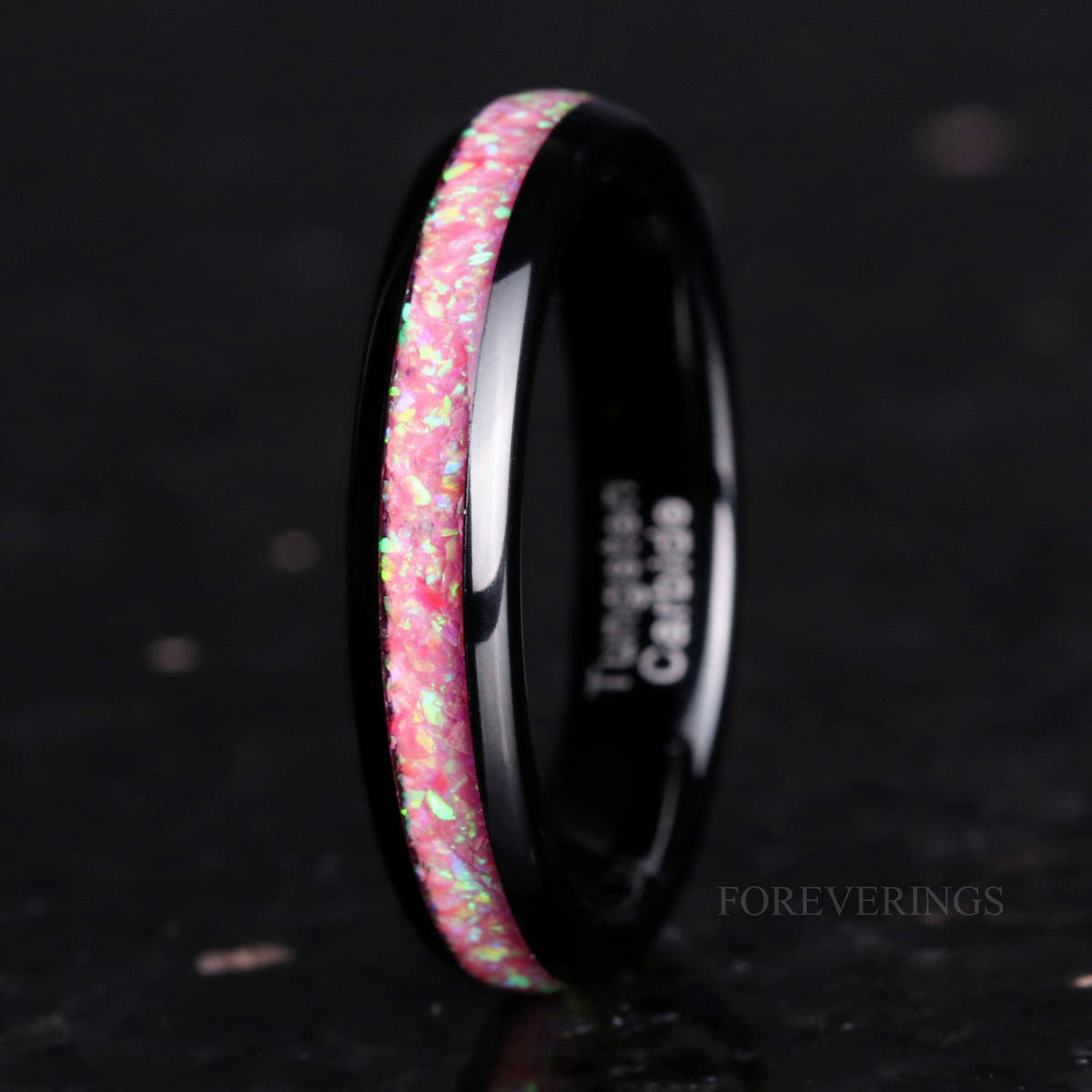Women's 4mm black tungsten ring with pink fire opal inlay, polished dome