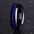 Black tungsten band labeled 6mm with Great Rift blue sandstone inlay, standing on edge