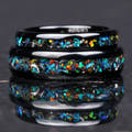 His and hers wedding bands in black tungsten with meteorite and galaxy opal, stacked flat