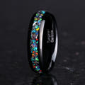 Men's 6mm polished black tungsten band with meteorite and galaxy opal inlay, standing at an angle