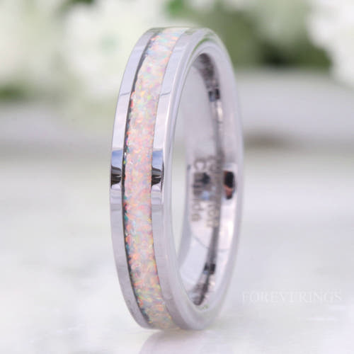 Women's 4mm silver tungsten ring with crushed white fire opal inlay, standing upright