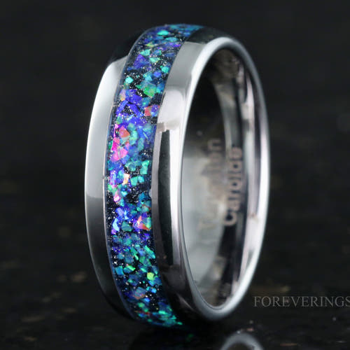 Men's 8mm silver tungsten ring with galaxy opal inlay, angled to show the polished interior