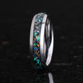 Men's 6mm polished silver tungsten band with meteorite and galaxy opal inlay, standing at an angle