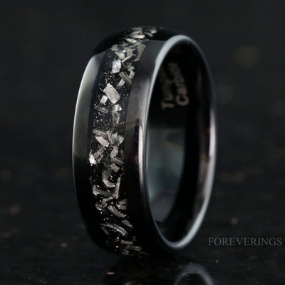 Men's 8mm black tungsten wedding band with a crushed meteorite inlay, polished dome